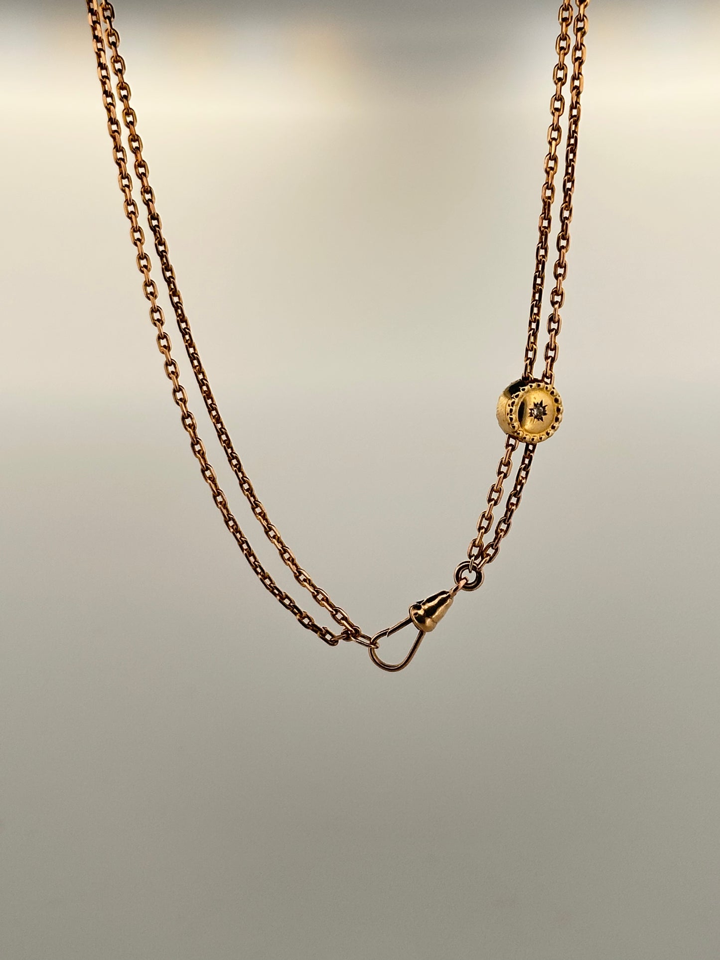 Antique Victorian watch chain with diamond slider in 10k yellow gold