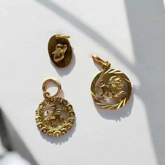 vintage solid gold zodiac charms - 14k Leo and Scorpio pendants