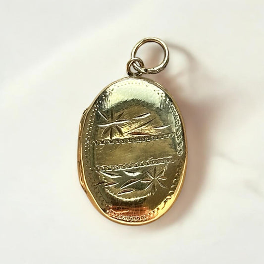 vintage 14k yellow gold locket with hand engraved detail